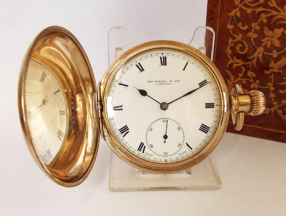 A 1920s Thomas Russell full hunter pocket watch.