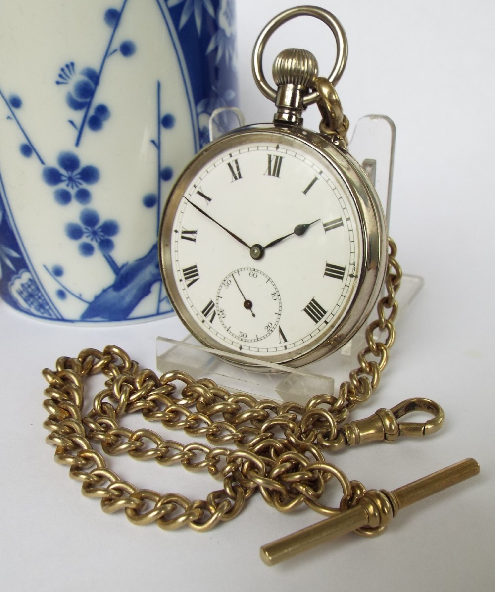 Antique pin-set Swiss pocket watch and chain, circa 1910s