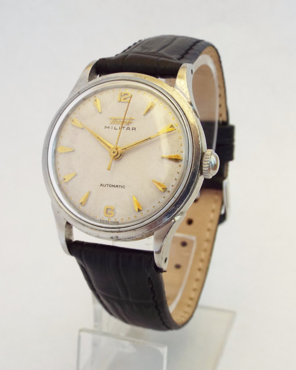 A gents 1955 Tissot Militar automatic wrist watch.