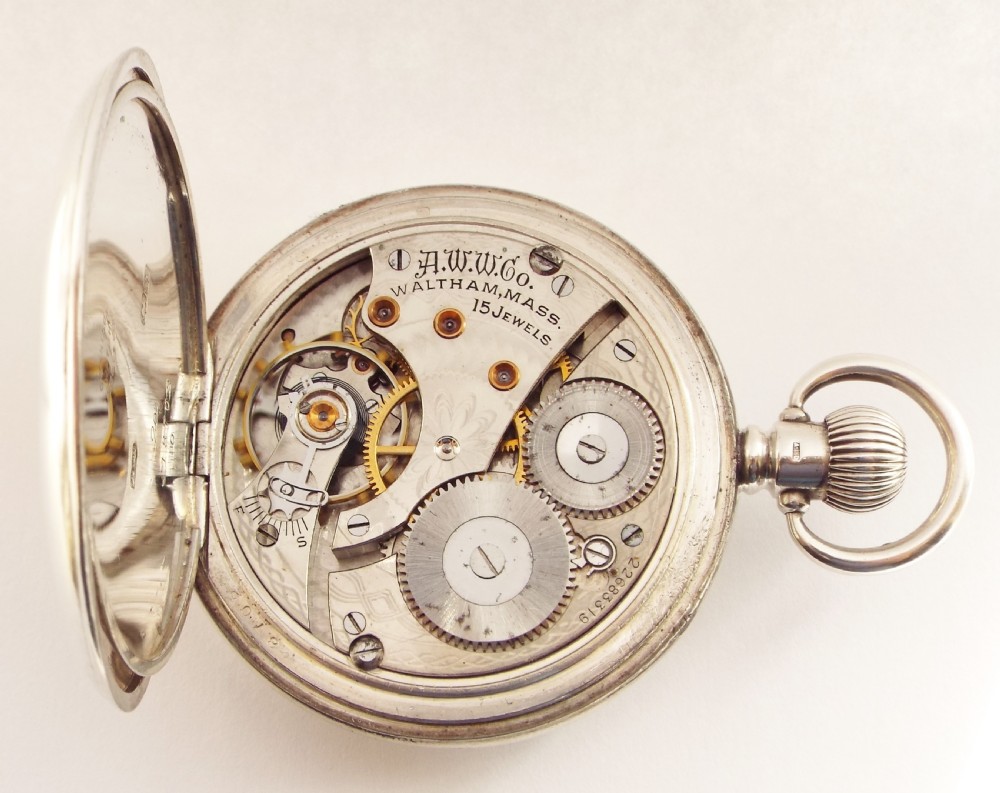 A 1920s silver half hunter Waltham pocket watch. View VI