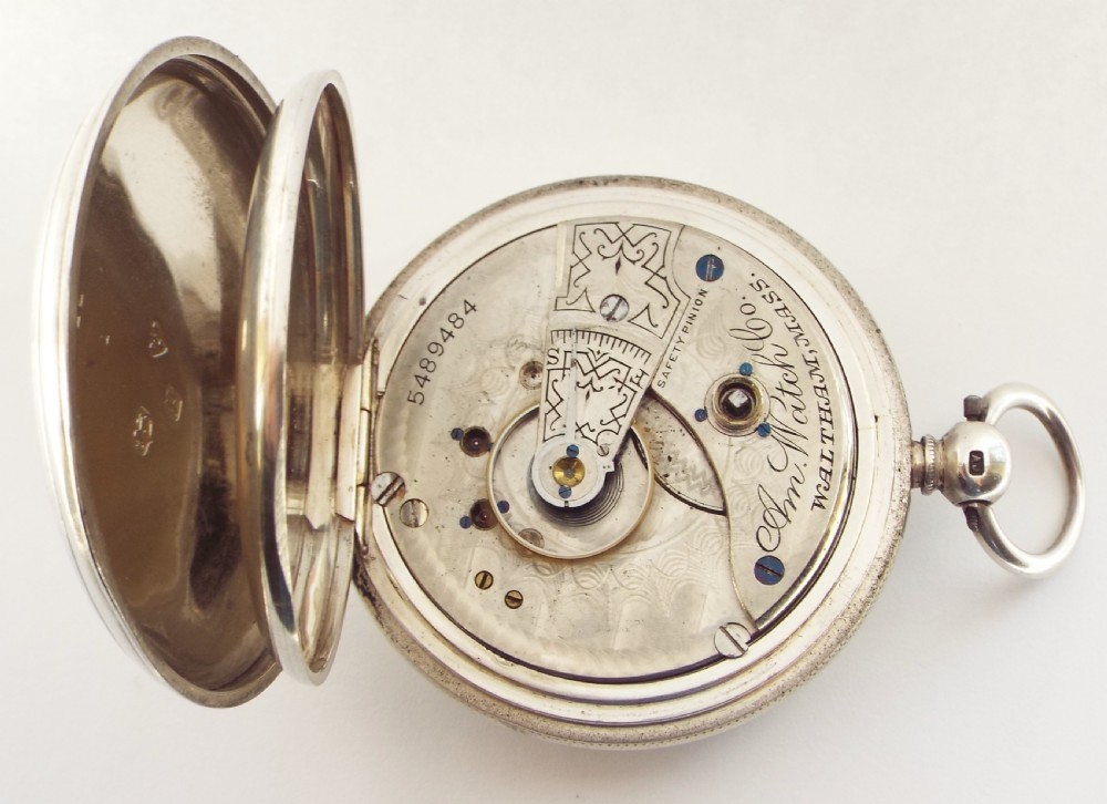 An antique silver Waltham pocket watch. View V