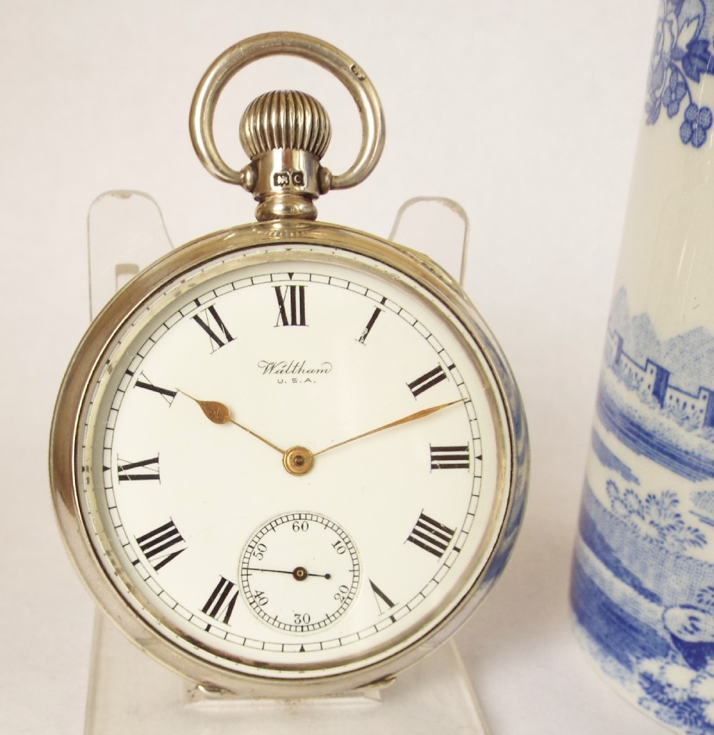 A 1920s silver Waltham pocket watch.