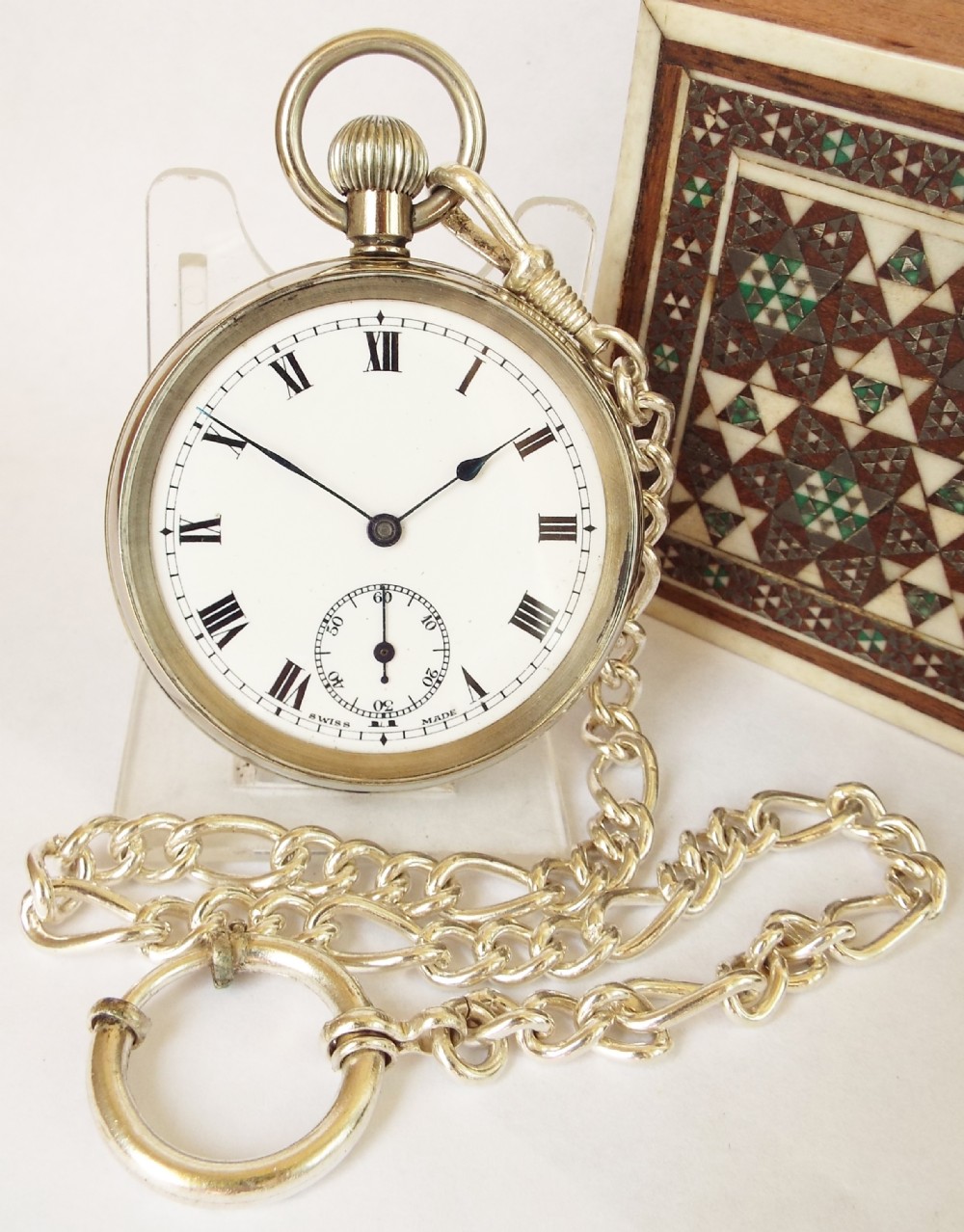 A vintage 1920s Lanco stem winding pocket watch & chain.