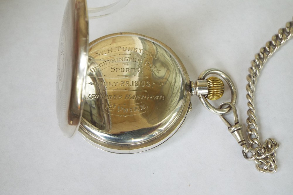 Antique Swiss silver pocket watch and chain View V