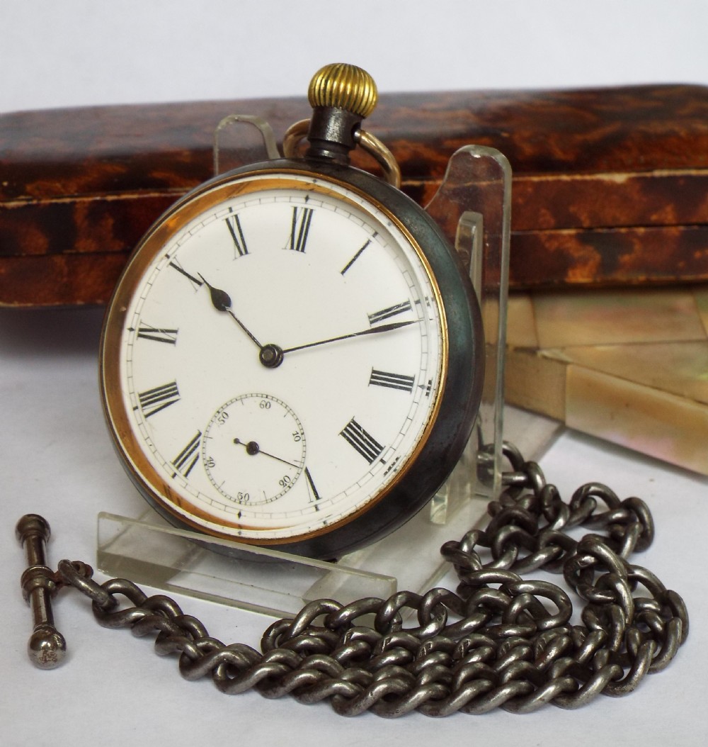 Antique gun metal Omega pocket watch and chain
