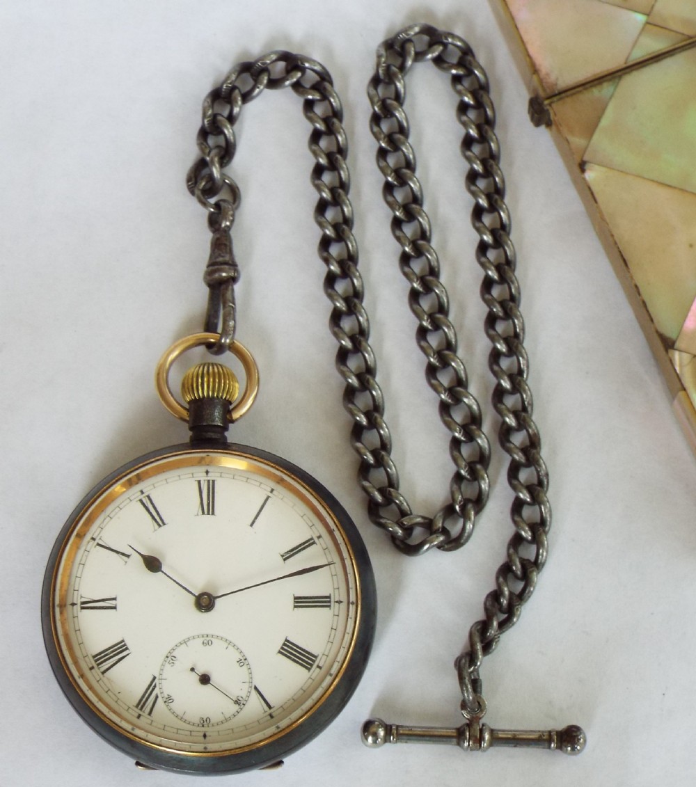 Antique gun metal Omega pocket watch and chain View II