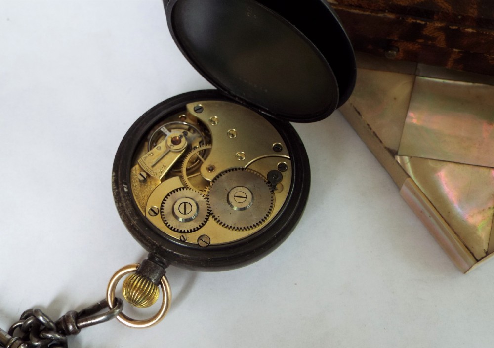 Antique gun metal Omega pocket watch and chain View III