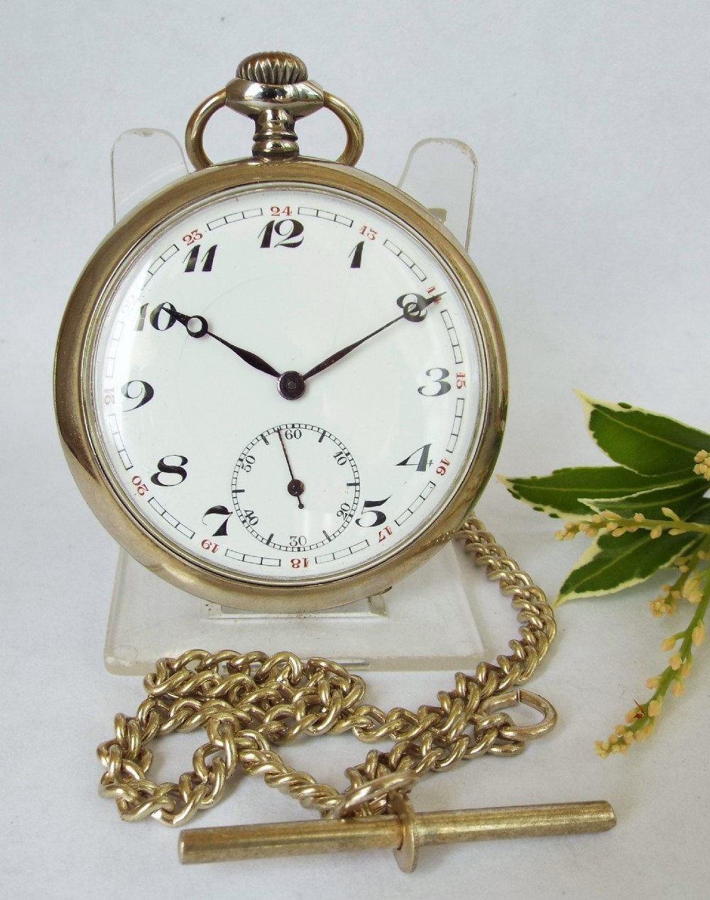 1920s Swiss pocket watch and chain.