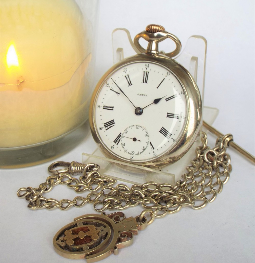 Antique Omega pocket watch and chain