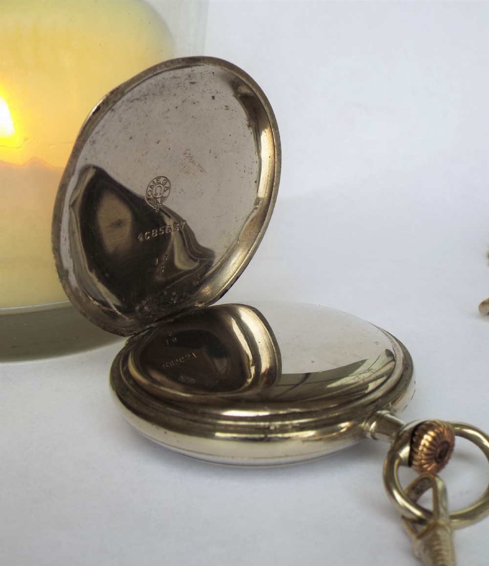 Antique Omega pocket watch and chain View V