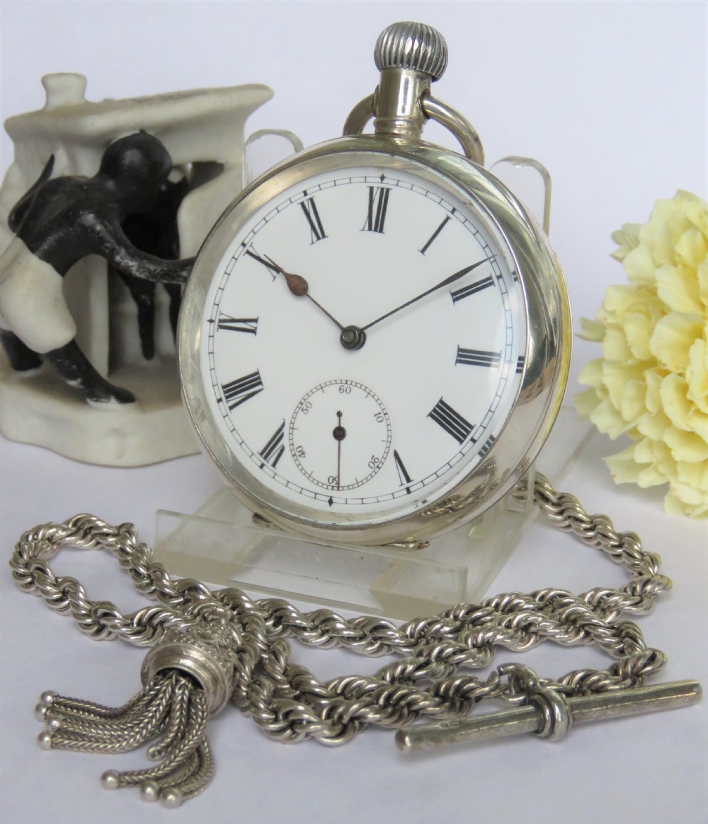 Antique silver Omega pocket watch and chain