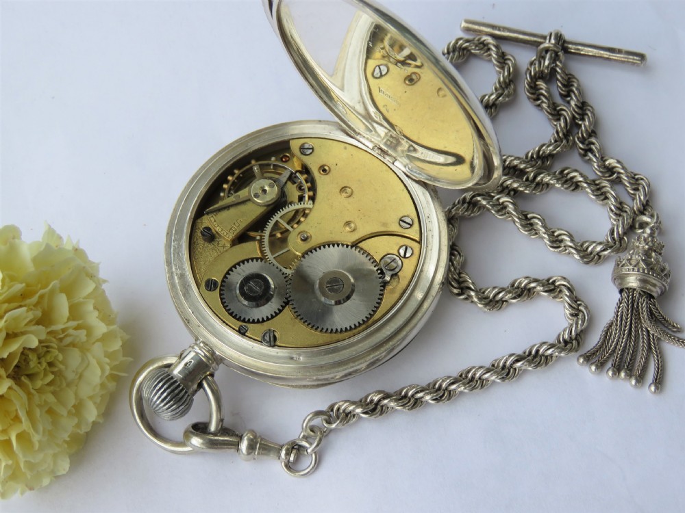 Antique silver Omega pocket watch and chain View V