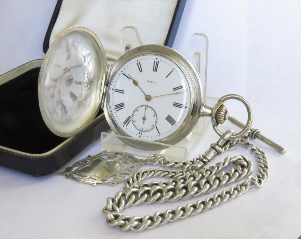 Antique silver Omega hunter pocket watch and chain