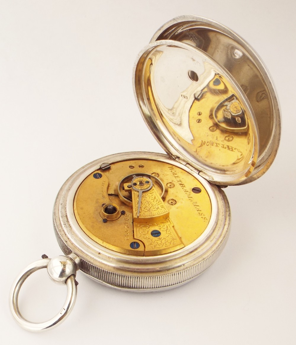 An antique 1895 silver Waltham pocket watch. View IV