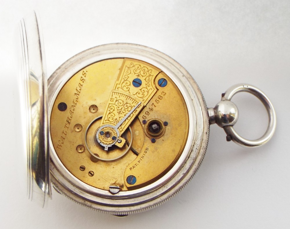 An antique 1895 silver Waltham pocket watch. View V