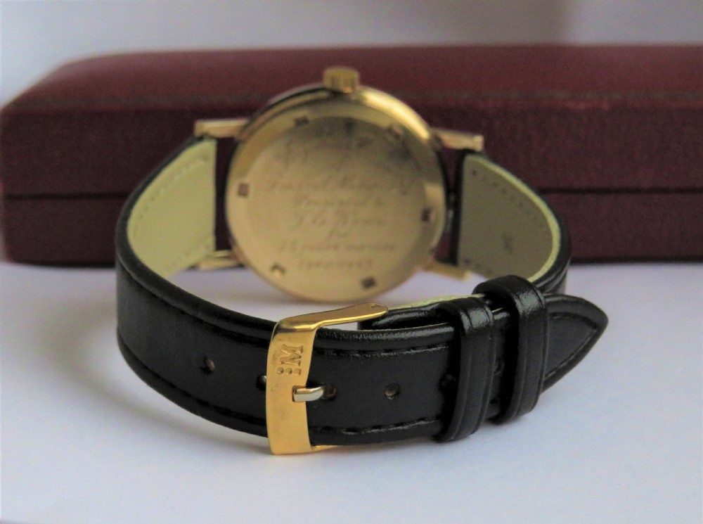 Gents 9ct gold Garrard wristwatch, 1964 View V