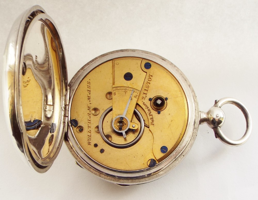 An antique 1882 silver Waltham pocket watch. View V