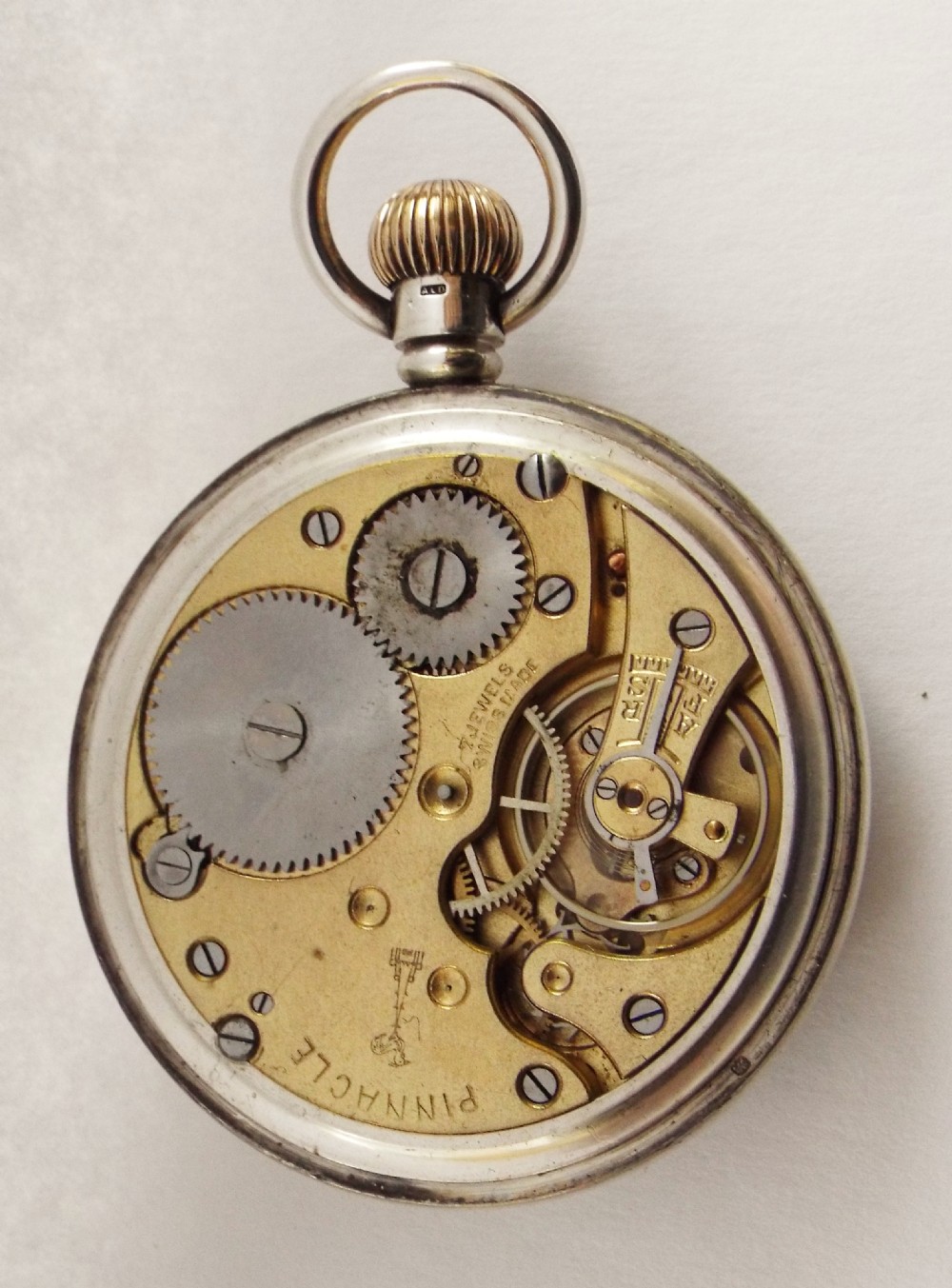 A 1932 silver Pinnacle stem winding pocket watch. View III