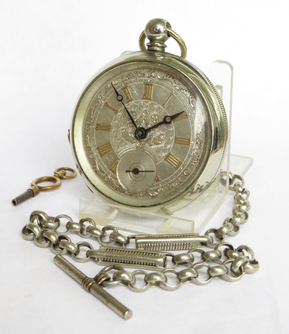 Antique key winding pocket watch and chain. 