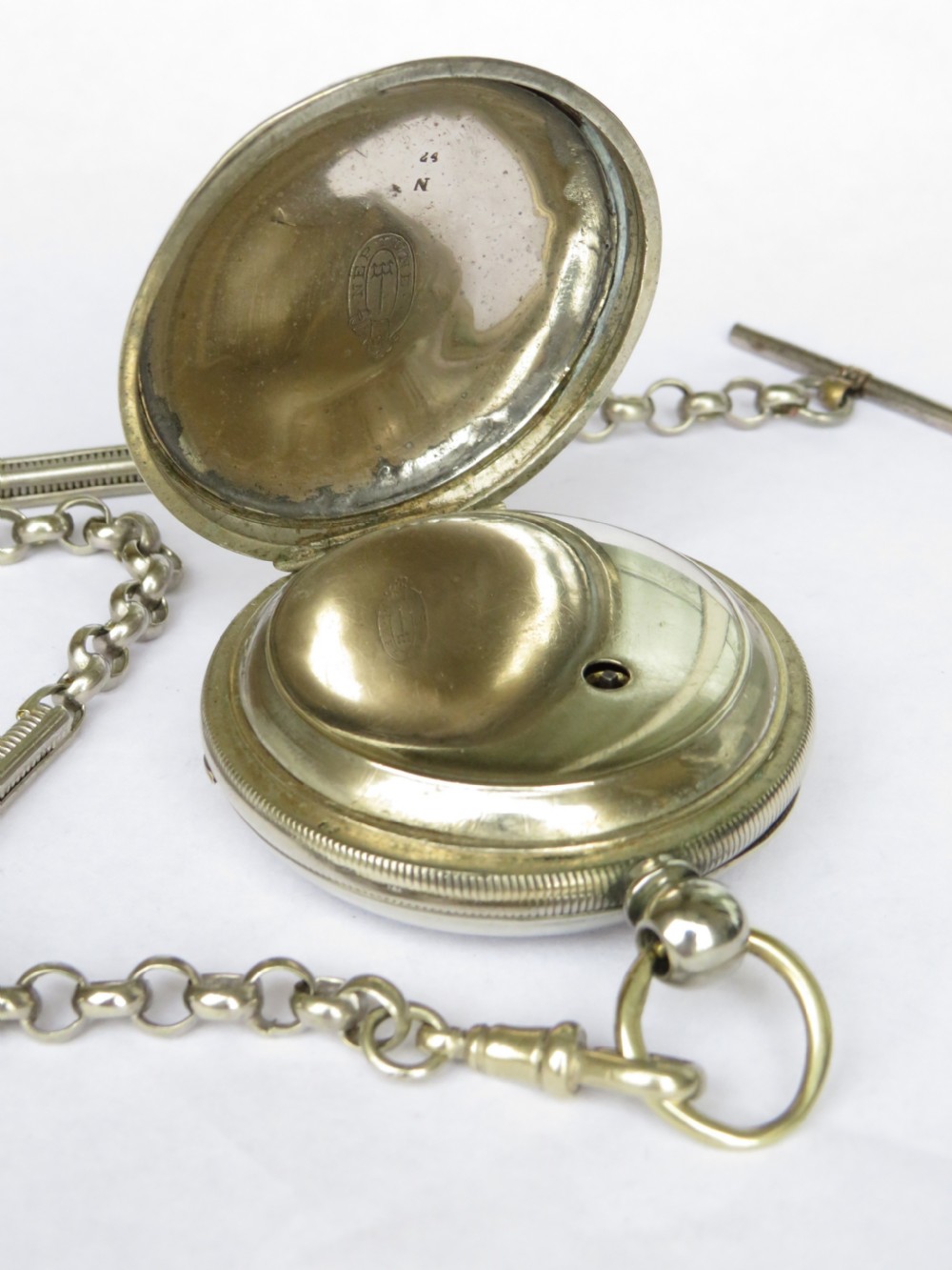 Antique key winding pocket watch and chain.  View III