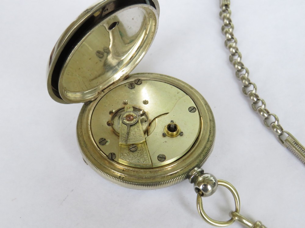 Antique key winding pocket watch and chain.  View IV