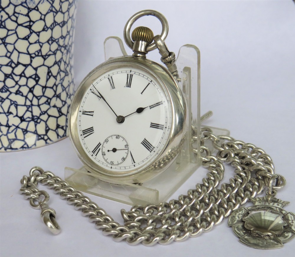 Antique silver Omega pocket watch and chain