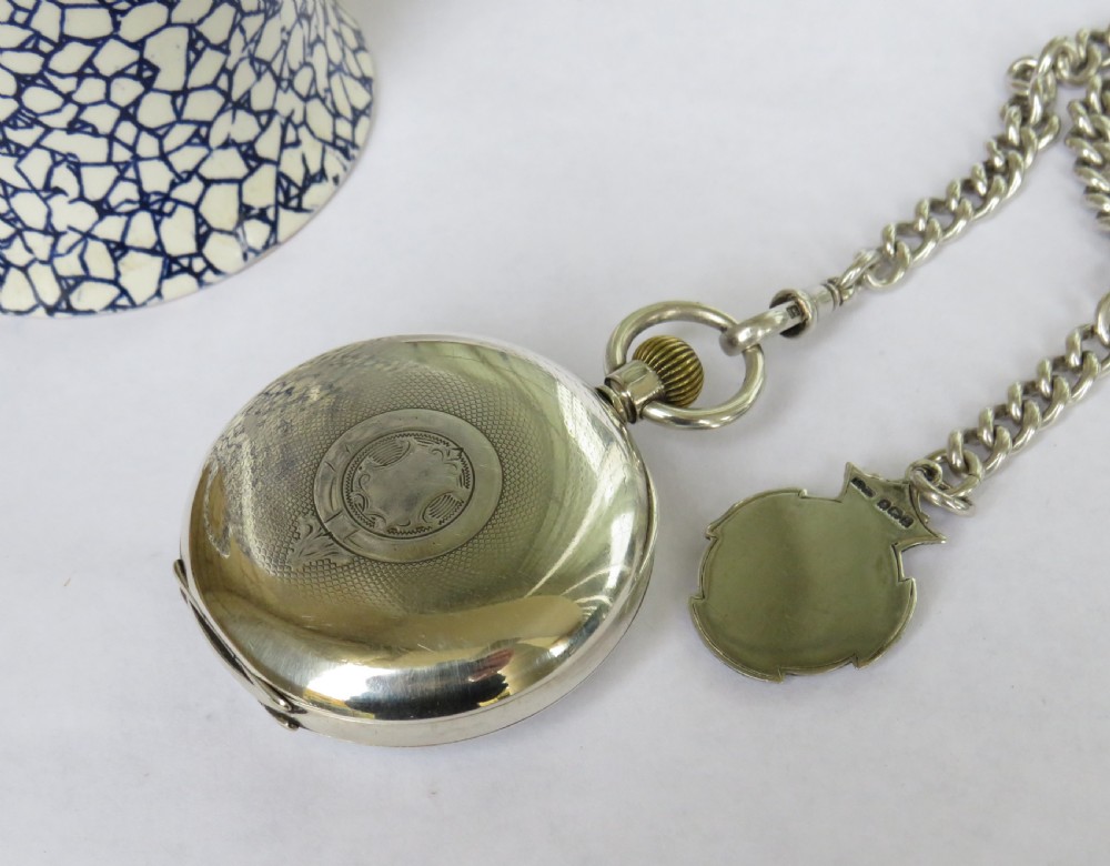 Antique silver Omega pocket watch and chain View V
