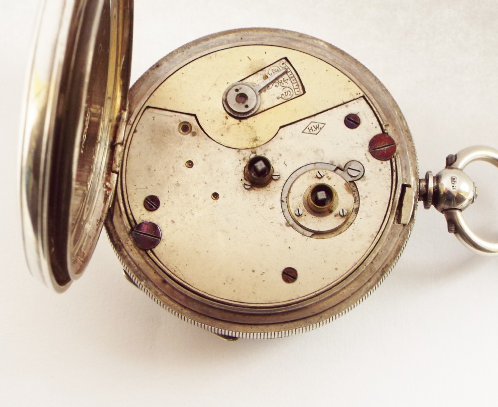An antique Kays silver pocket watch with silver albert. View VI