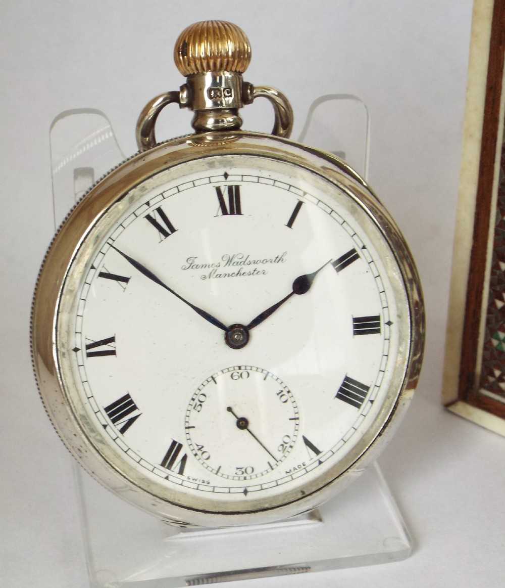 A vintage 1927 James Wadsworth, Manchester silver pocket watch.