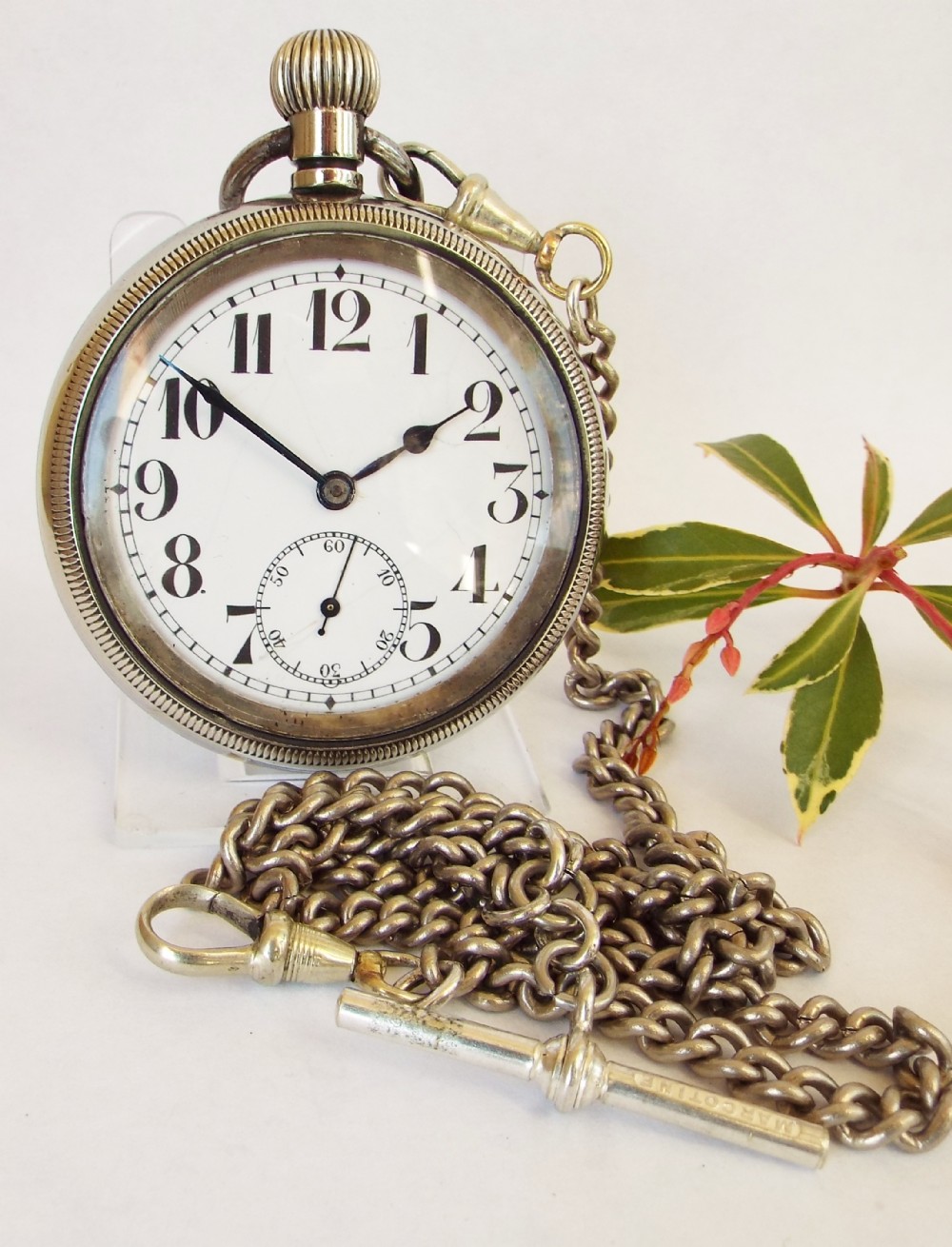 1920s nickel pocket watch and chain.