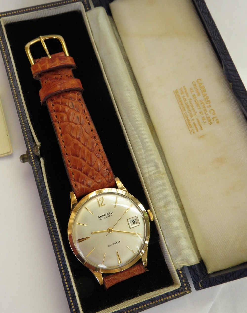 Gents boxed 9ct gold Garrard wrist watch View III