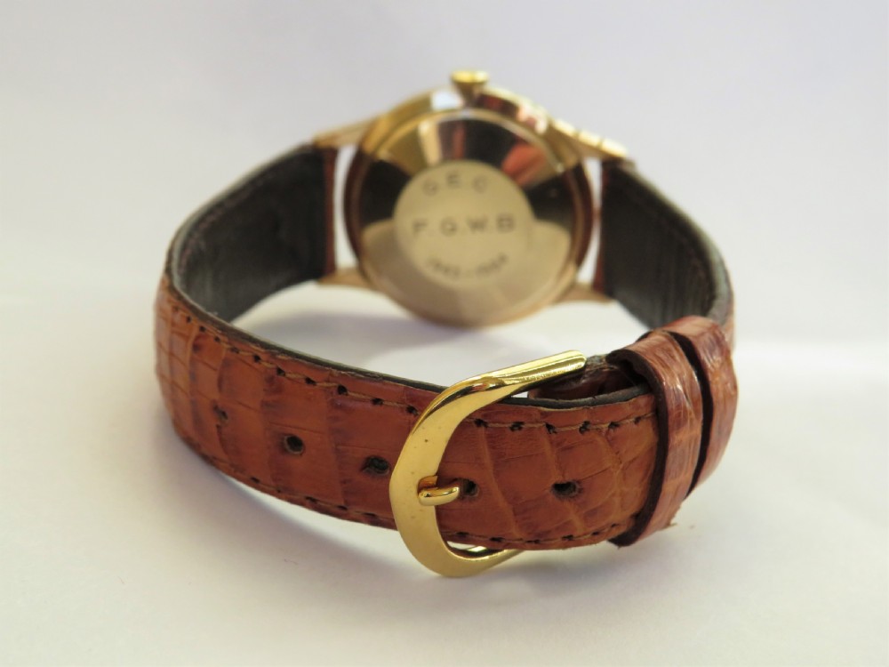 Gents boxed 9ct gold Garrard wrist watch View IV