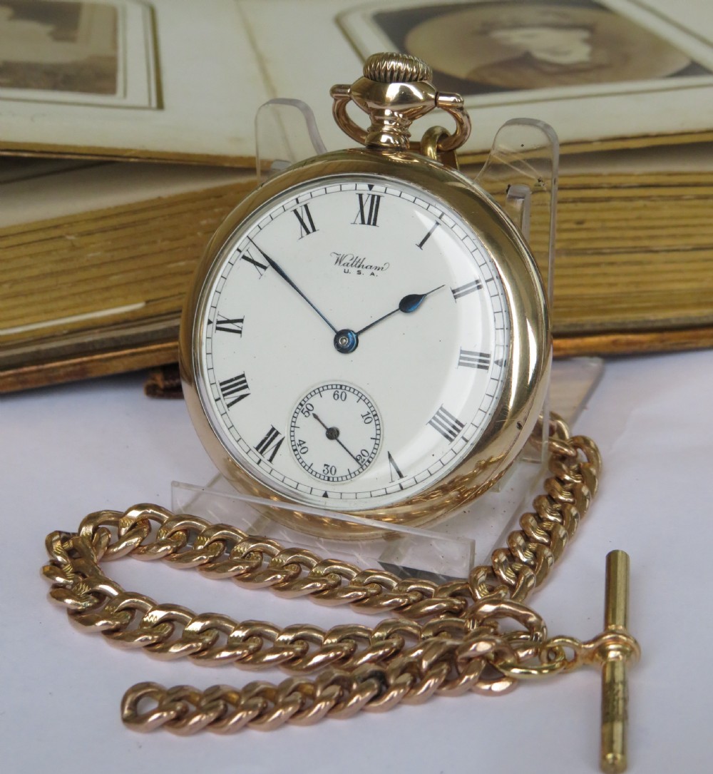 A 1918 Equity pocket watch & chain.
