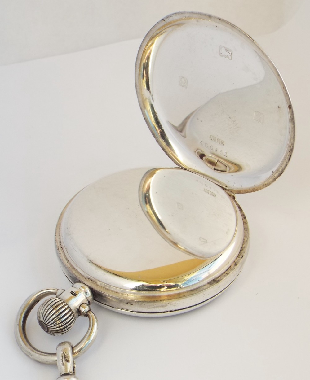 A 1920s silver pocket watch and chain. View III