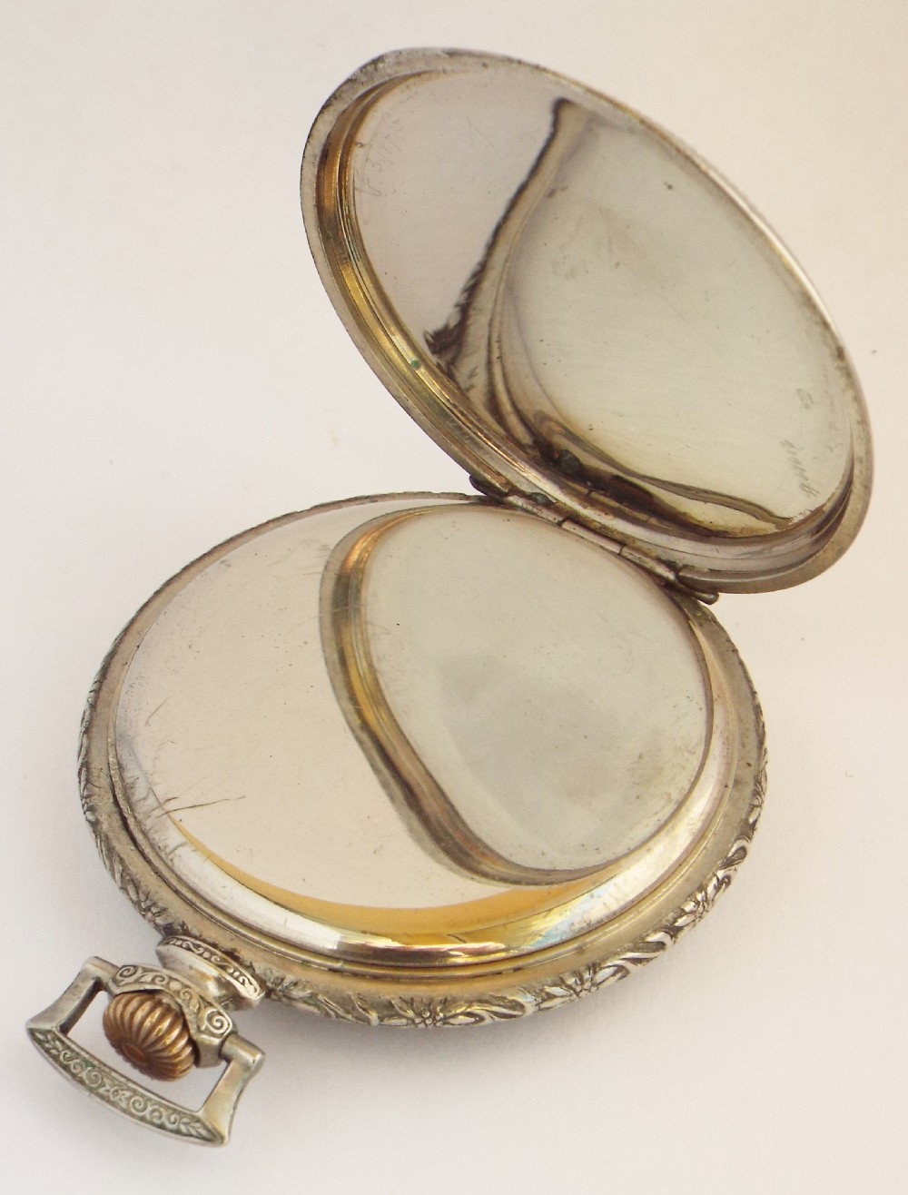 A 1930s Art Deco stem winding pocket watch. View III