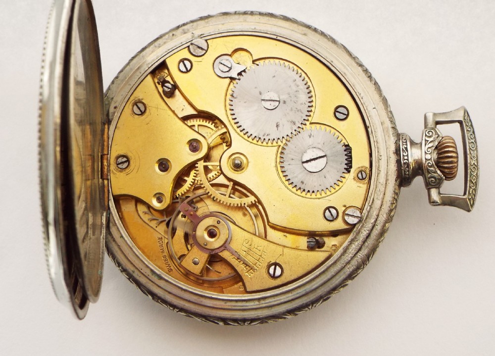 A 1930s Art Deco stem winding pocket watch. View V