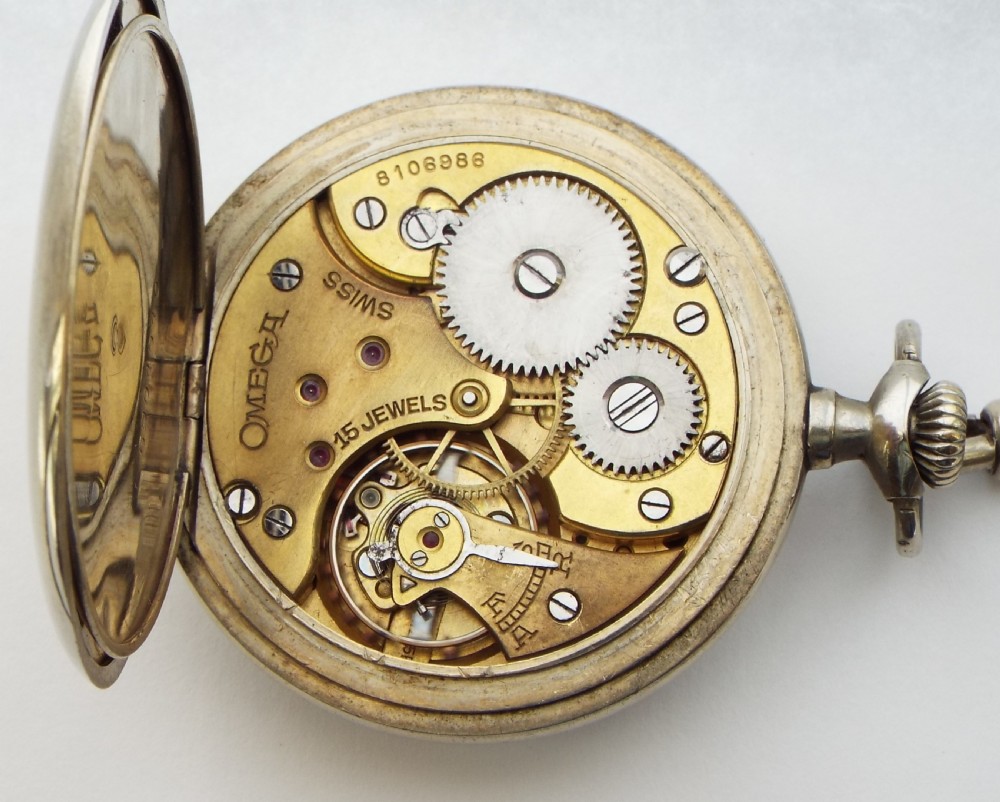1930s Omega pocket watch and chain. View V