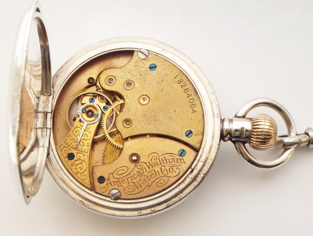 A lady’s antique silver Waltham fob watch and chain. View V