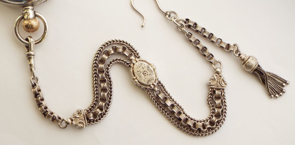 A lady’s antique silver Waltham fob watch and chain. View VI