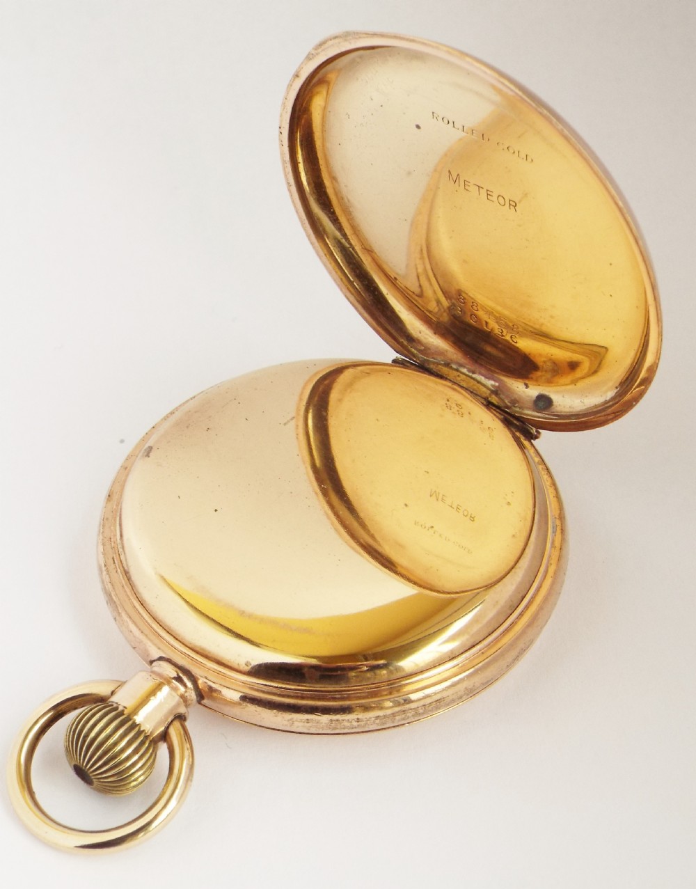 An “Exacta” full hunter pocket watch from H Samuel. View IV