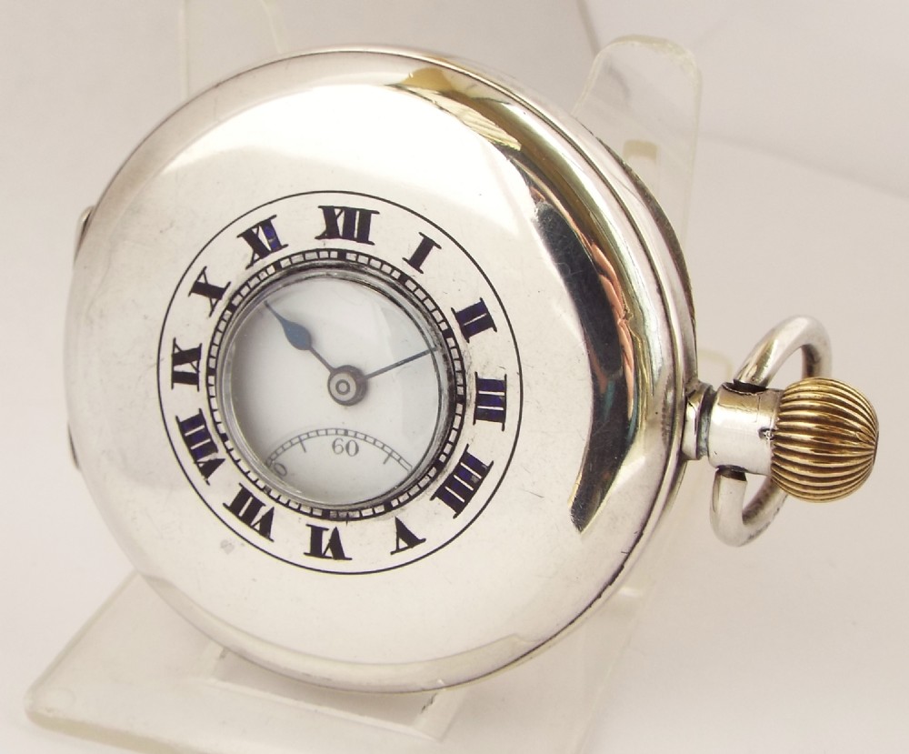 Antique silver Syren half hunter pocket watch by the Revue Thommen Watch Company.