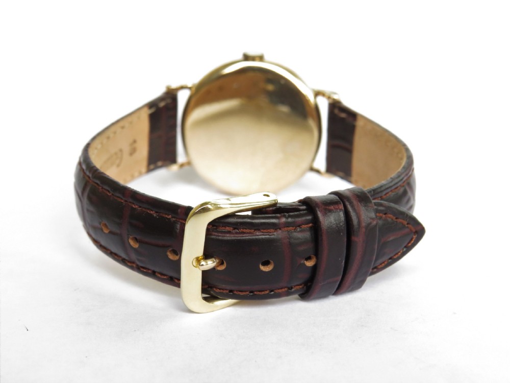 Gents 9ct gold Smiths De Luxe wrist watch, 1957 View IV