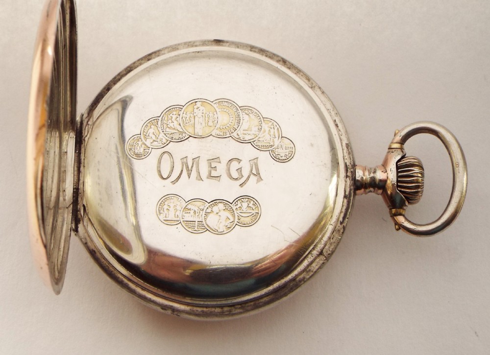 An antique Omega pocket watch. View IV