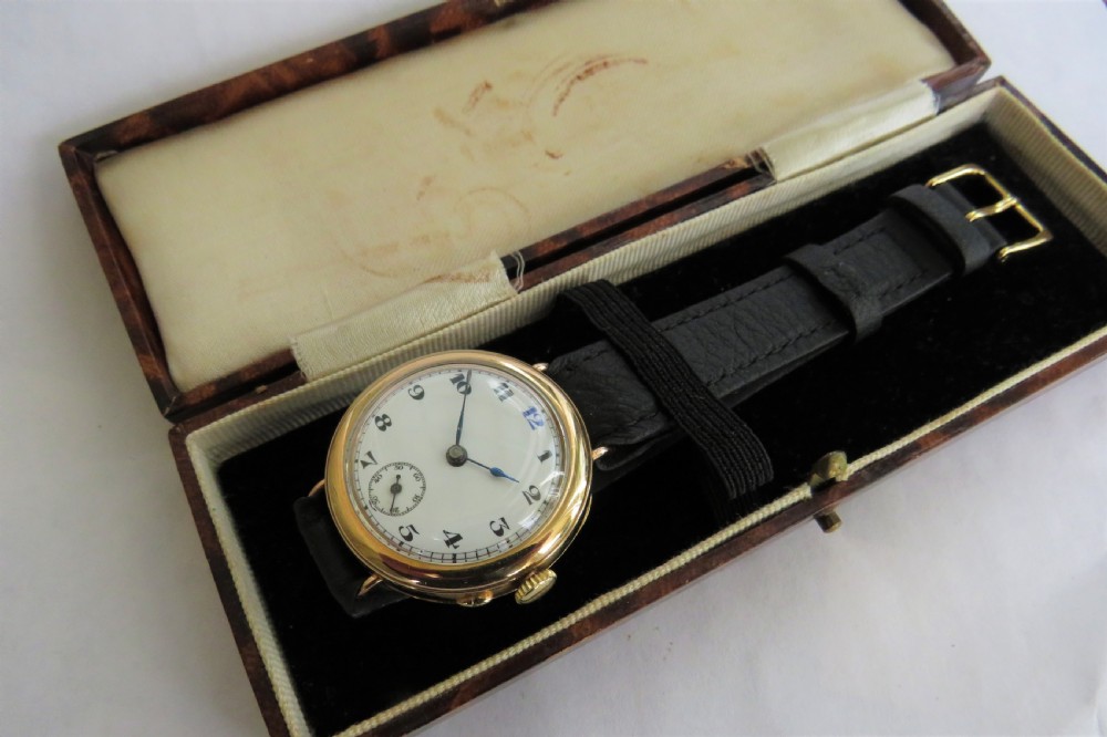 Gents boxed 9ct gold wrist watch, 1921 View V