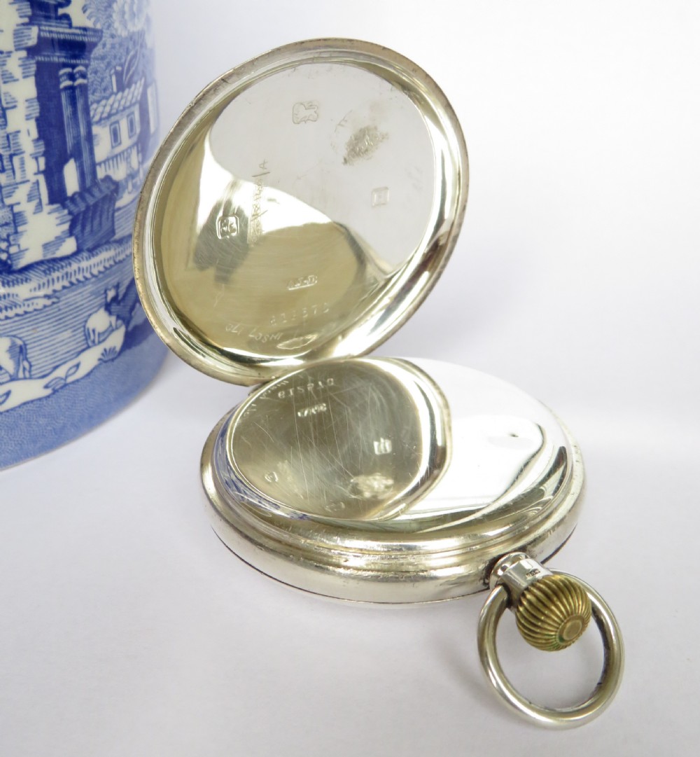 Silver Cyma half hunter pocket watch, J W Benson View V