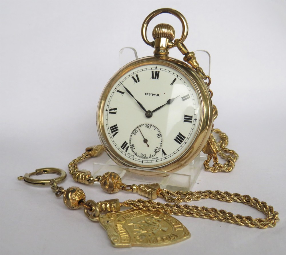 Antique Cyma pocket watch and albert