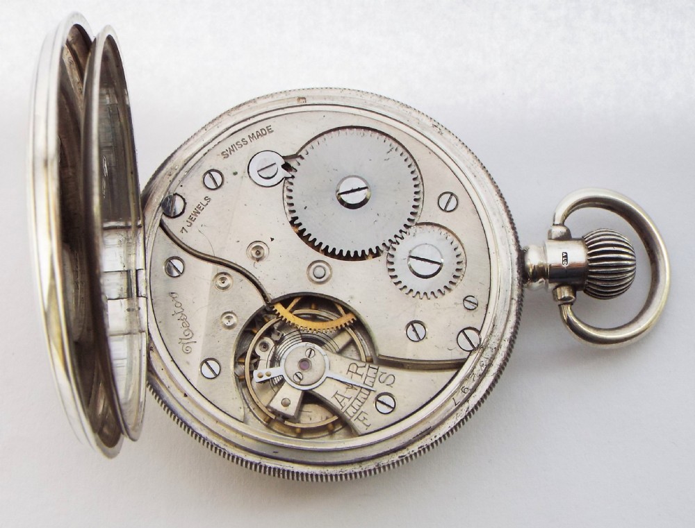 A 1920s silver Restor open faced pocket watch. View IV