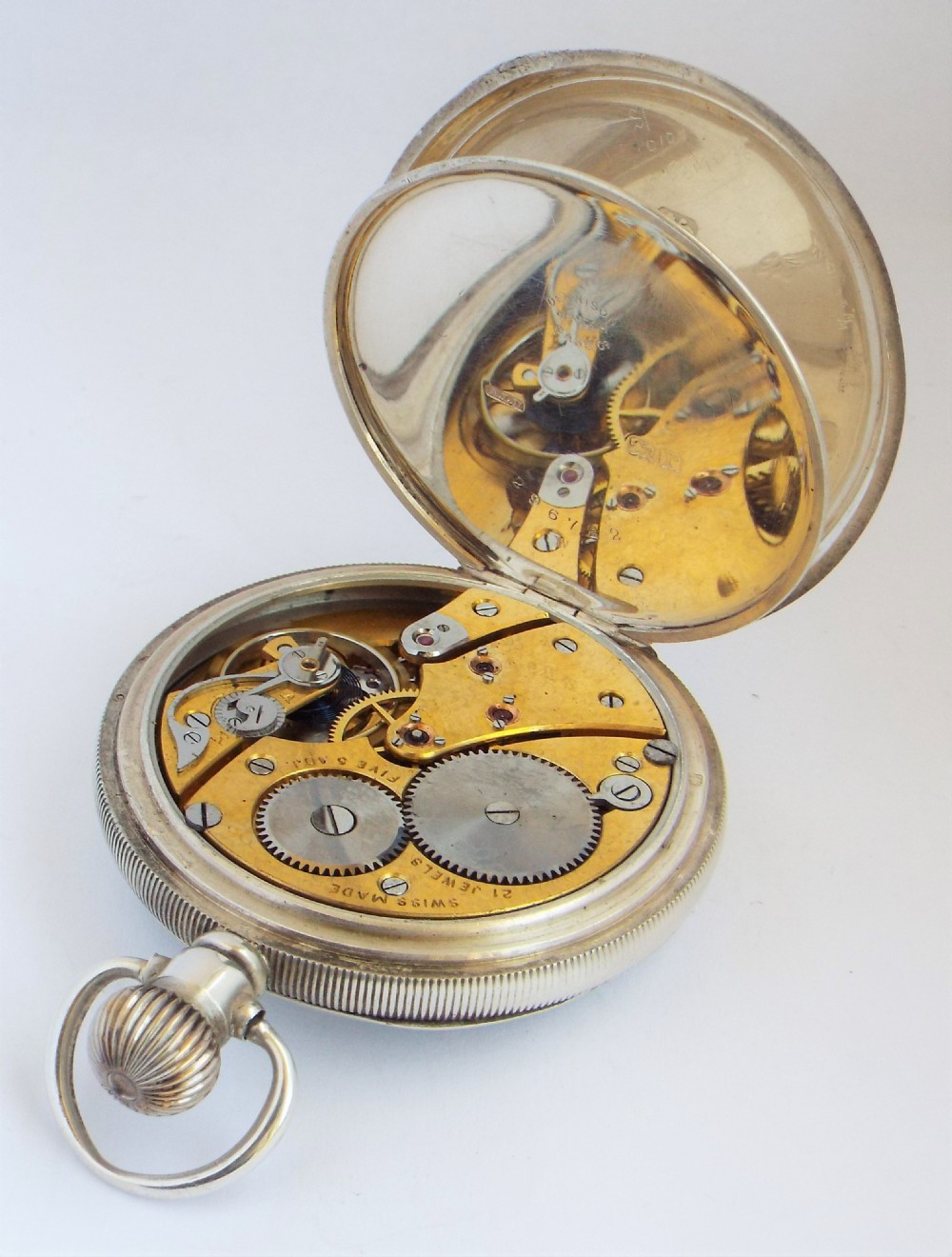 Antique Revue pocket watch from J W Benson. View IV