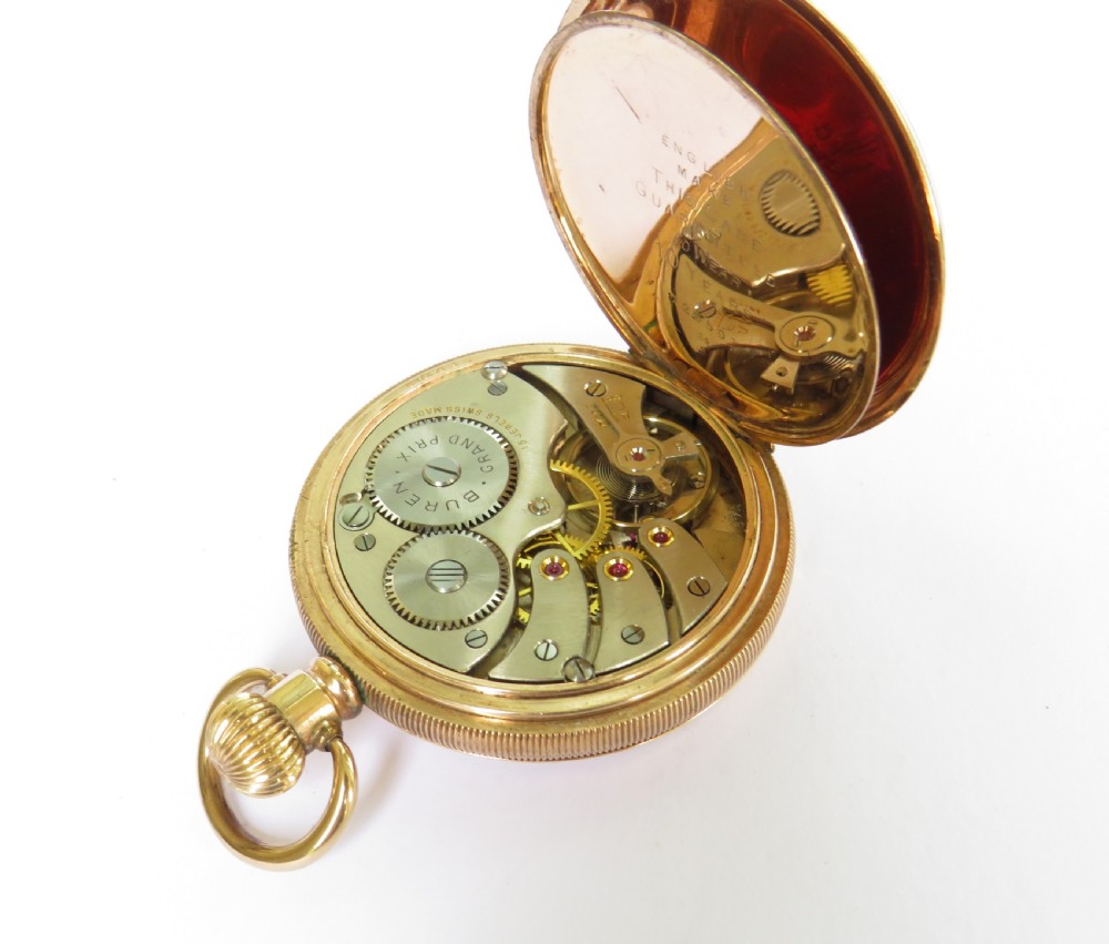 A 1940s Garrard half hunter pocket watch. View V
