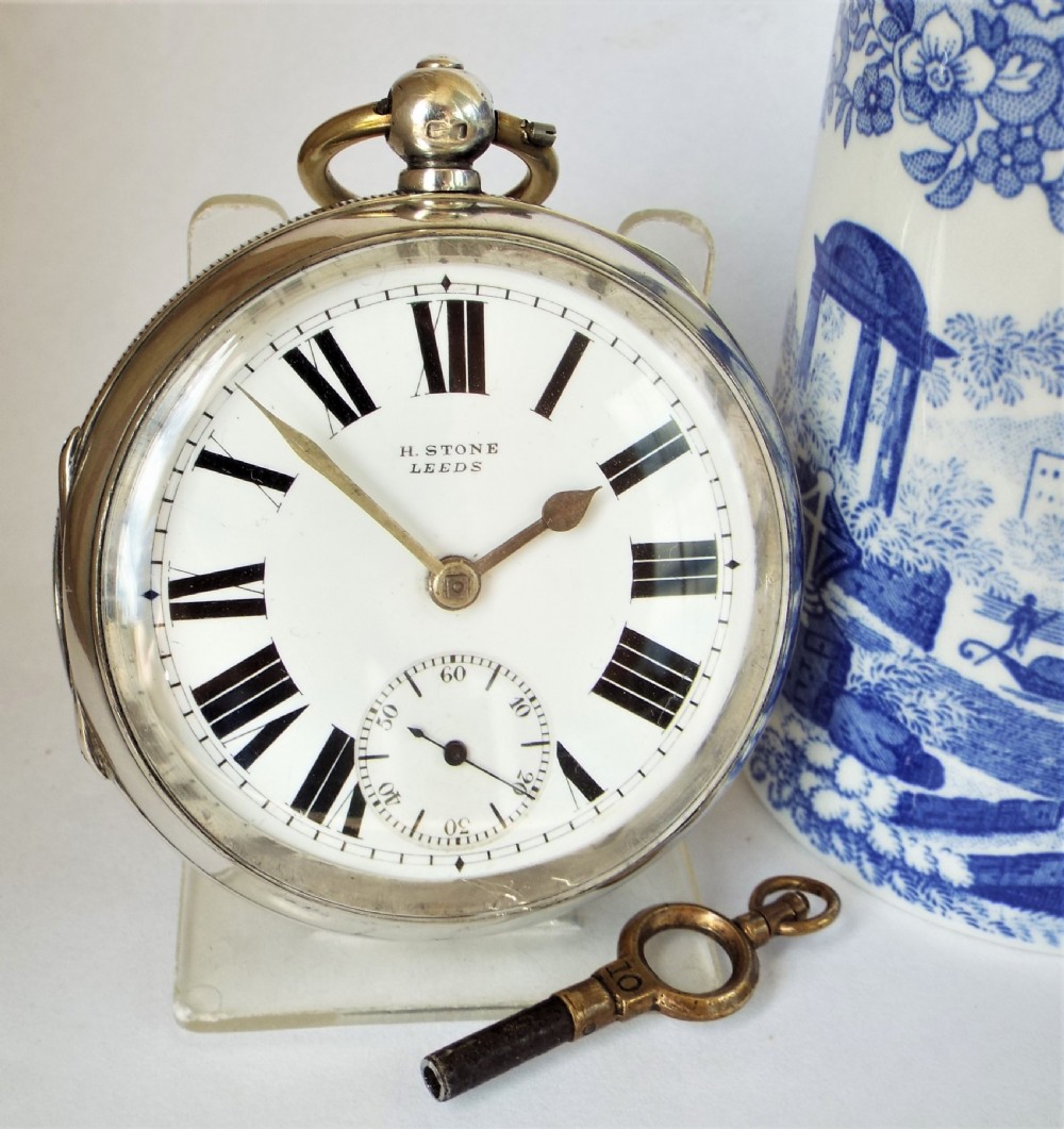 Antique silver Lancashire Watch Company pocket watch retailed by H Stone of Leeds.